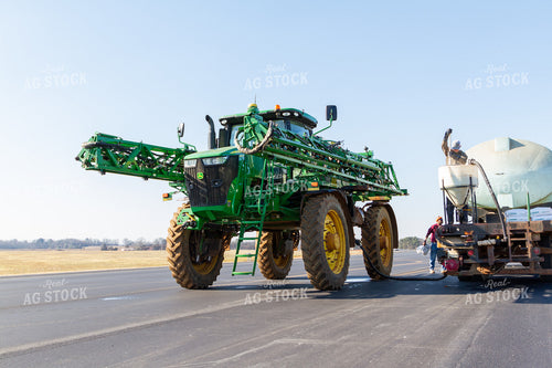 Sprayer Being Filled with Chemicals 79079