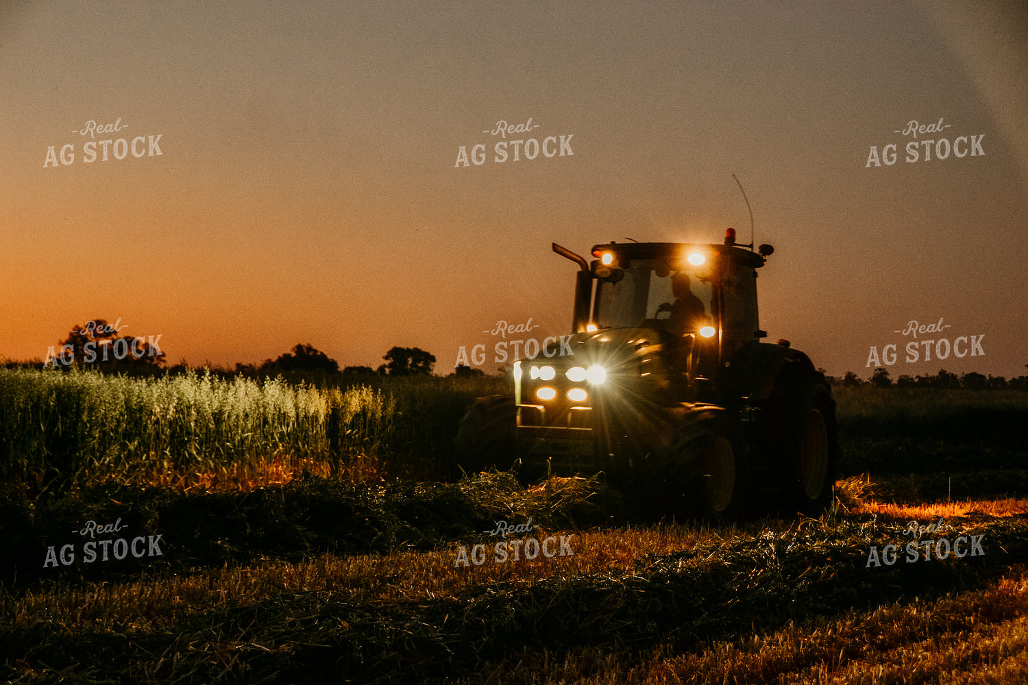 Tractor Raking Hay at Night 64082