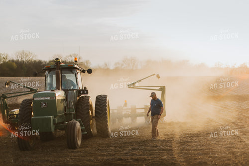 Farmer Walking Towards Planter 7444