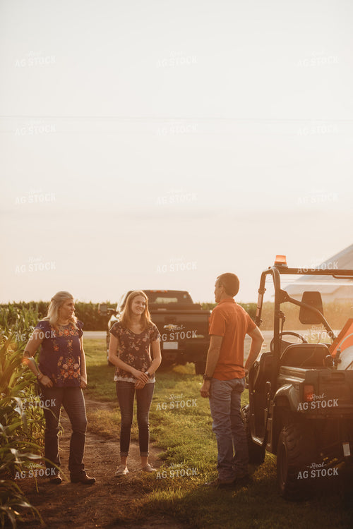Farmer with UTV Corn Field and Family 4561