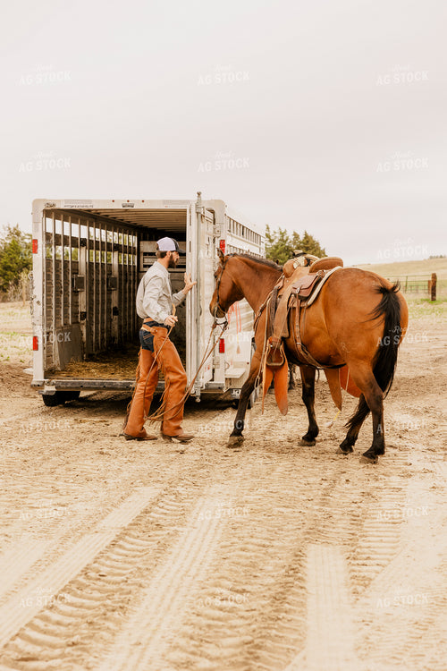 Rancher Loading Horse 207019