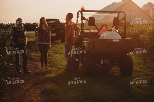 Farmer with UTV Corn Field and Family 4560