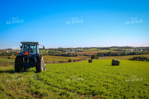Driving Tractor in Pasture 214088