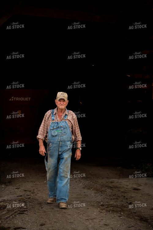 Farmer Walking by Shed 115901