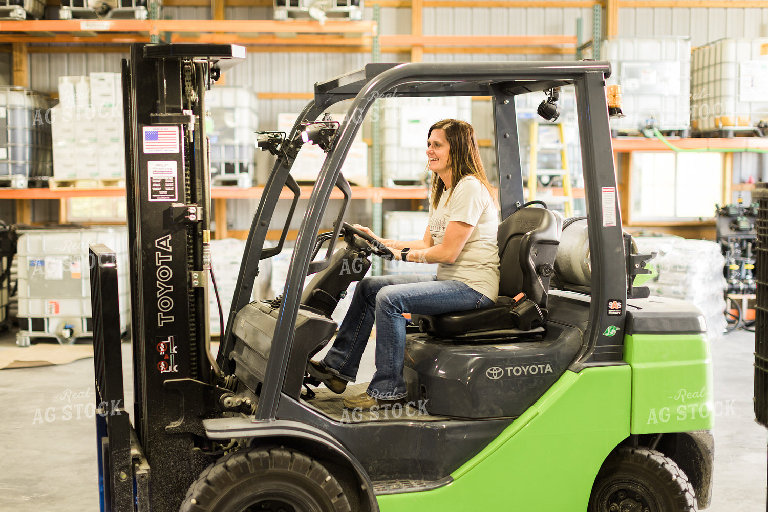 Woman Farmer Drives Skid Steer 7487