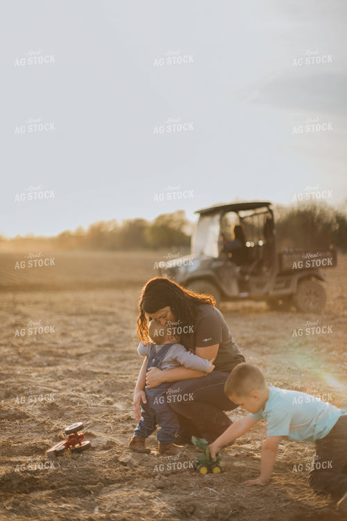 Farmer and Farm Kids in Field 7430