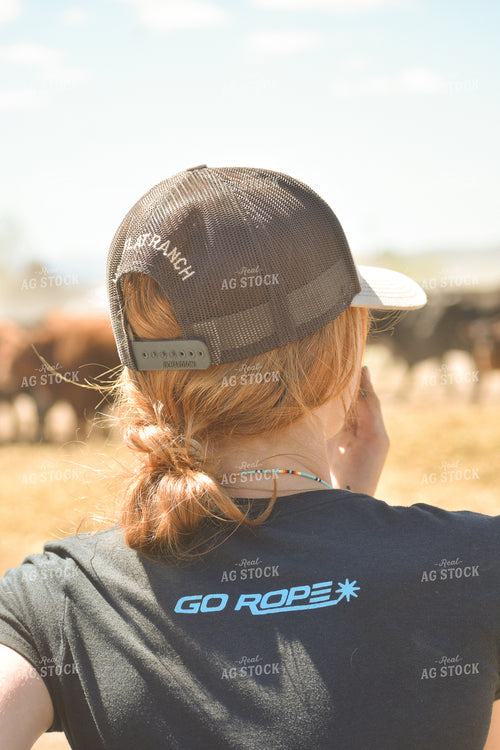 Female Rancher Overlooking Cattle 263022