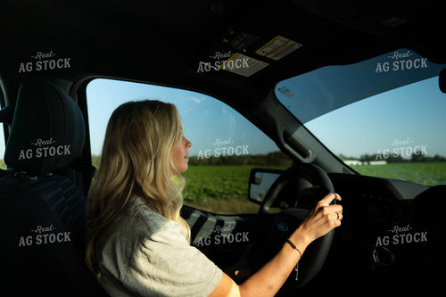 Farm Wife Driving to Field 115536