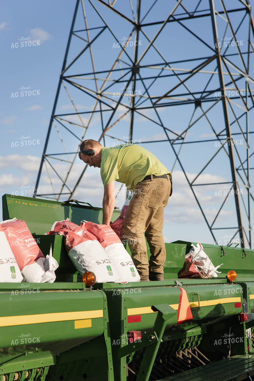 Farmer Filling Seeder 152866