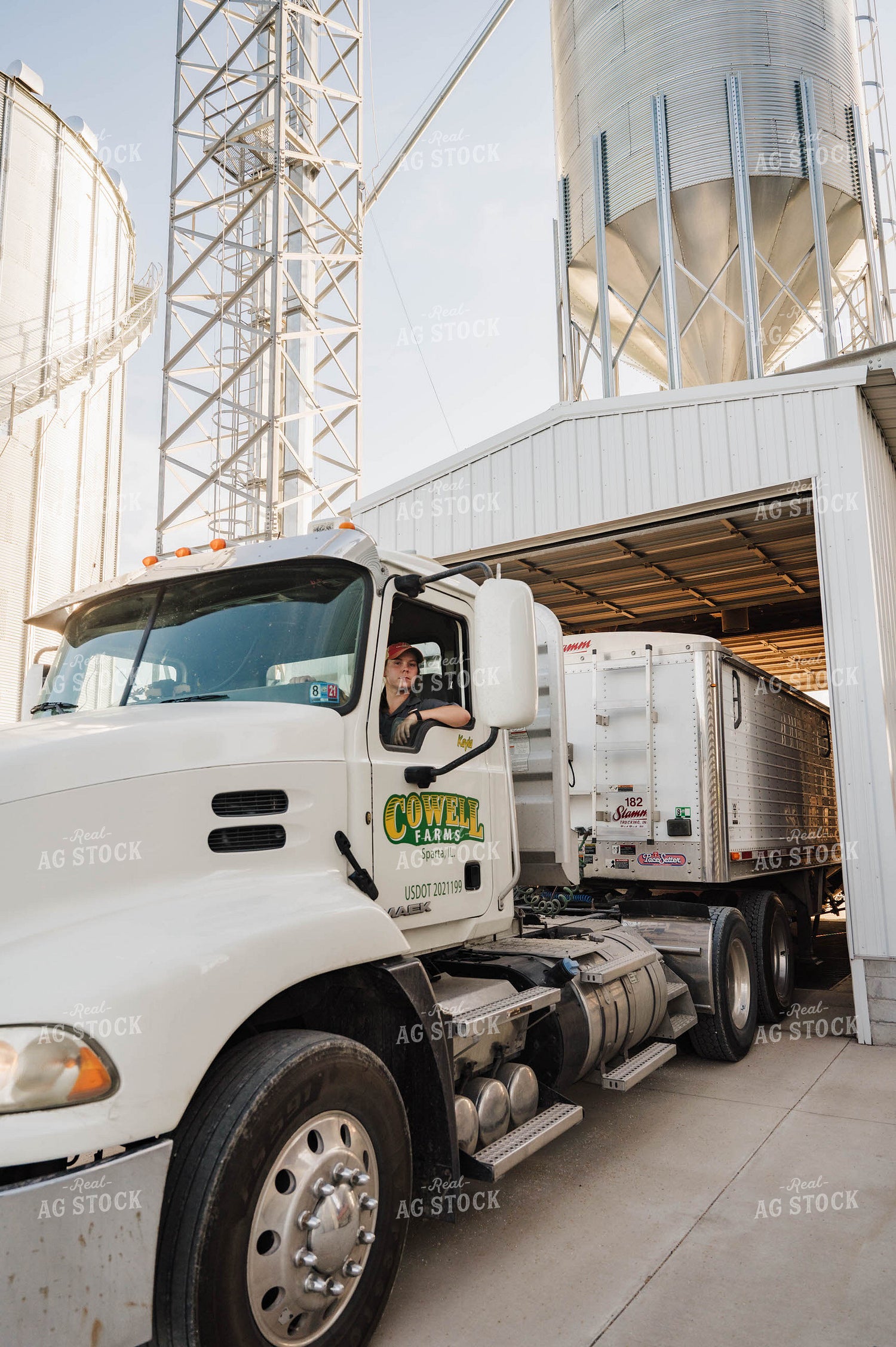 Female Farmer Driving Semi 115251
