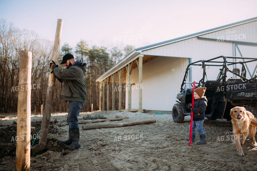 Farm Family Putting up Fence 169052