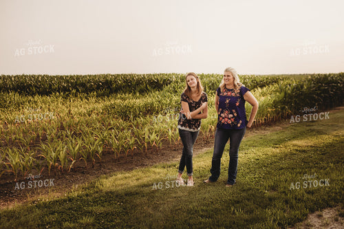 Farm Wife and Daughter next to Corn Field 4537
