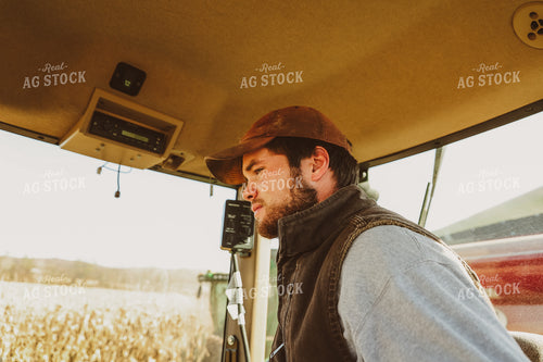 Farmer in Grain Cart Tractor Cab 52477