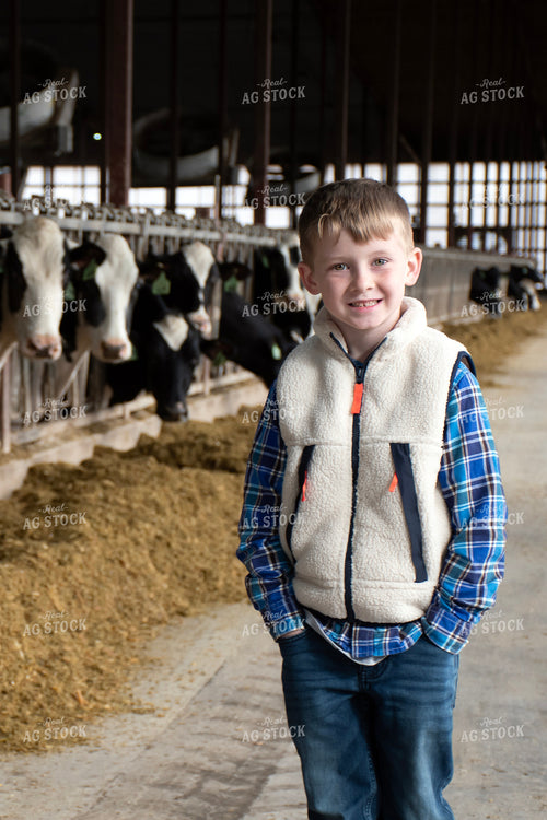 Farm Kid in Dairy Barn Alley 271036
