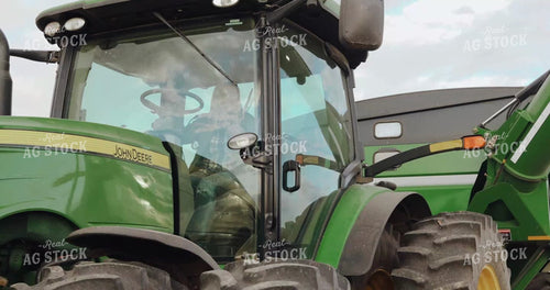 Female Farmer Climbing out of Grain Cart Tractor 3971