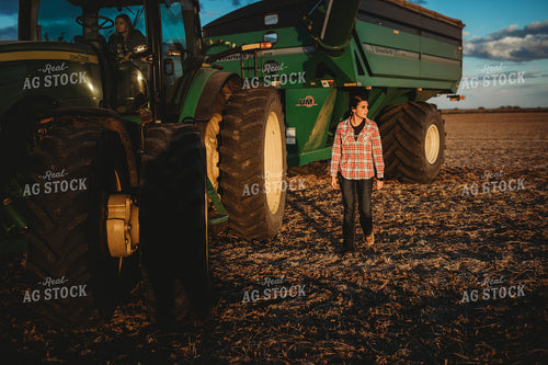 Female Farmer in Grain Cart 3450