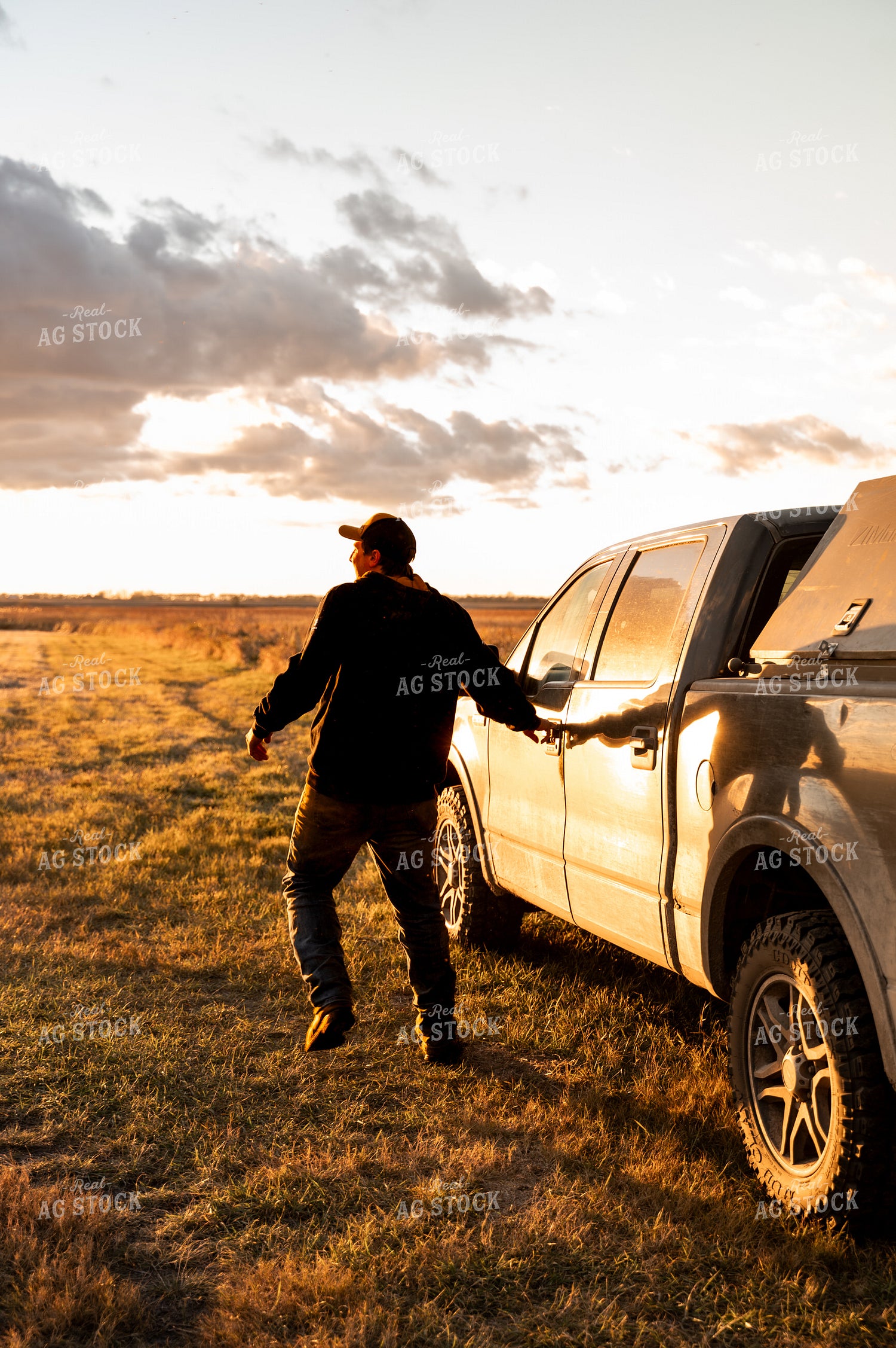Farmer Getting in Truck 185117