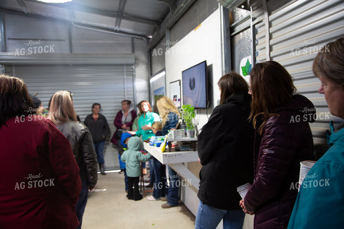 Farmers Standing in Shed 130007