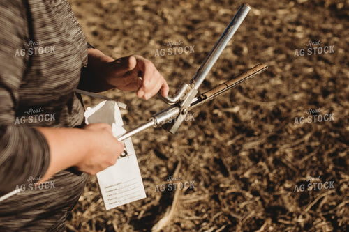 Farmer Opening Soil Sampling Probe with Soil Core 3715