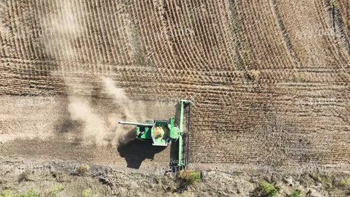 Aerial of Tractor Driving on Road 236000