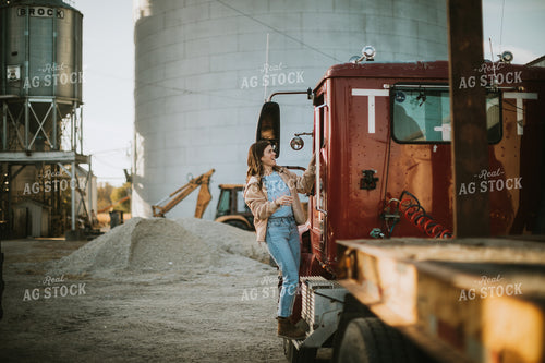 Female Farmer Talking into Semi 6829