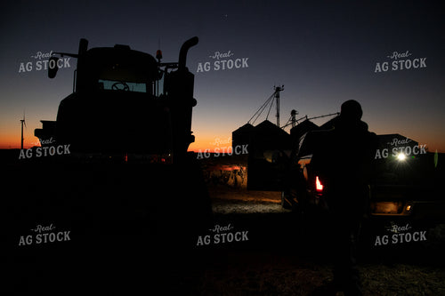 Farmer Preparing Tractor at Sunrise 25856