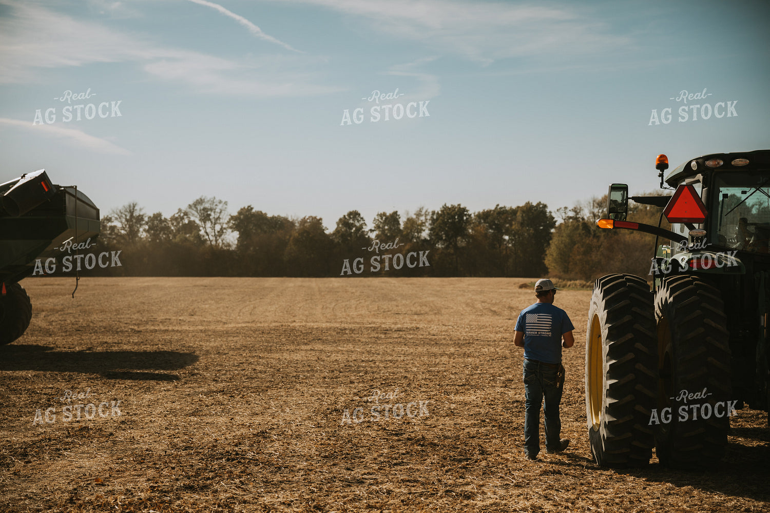 Farmer Walking Near Tractor 7077