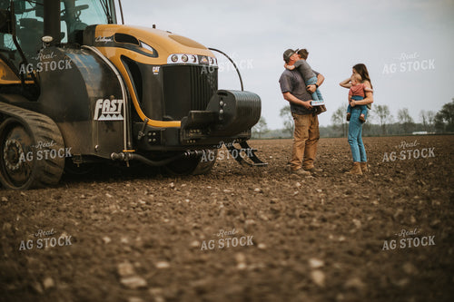 Farm Mom Taking Kids Out to Tractor During Planting 5643