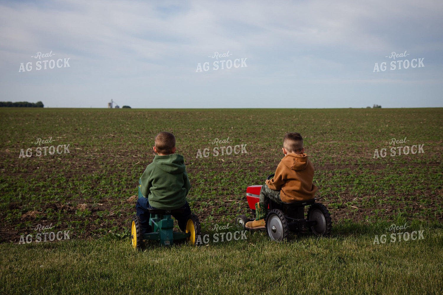 Farm Kids Playing on Toy Tractors 268278