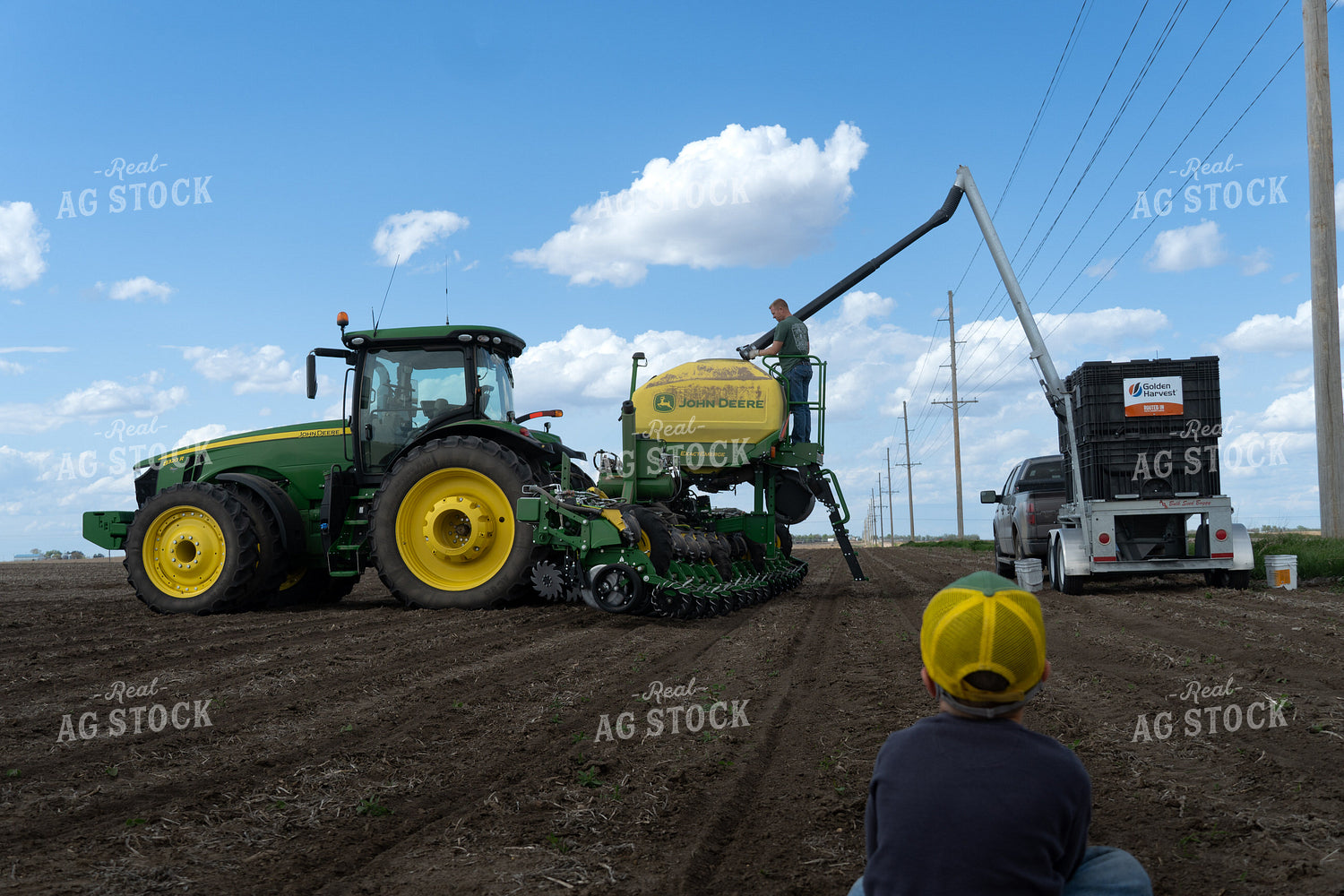 Farm Kid Watching Farmer Fill Planter 65414