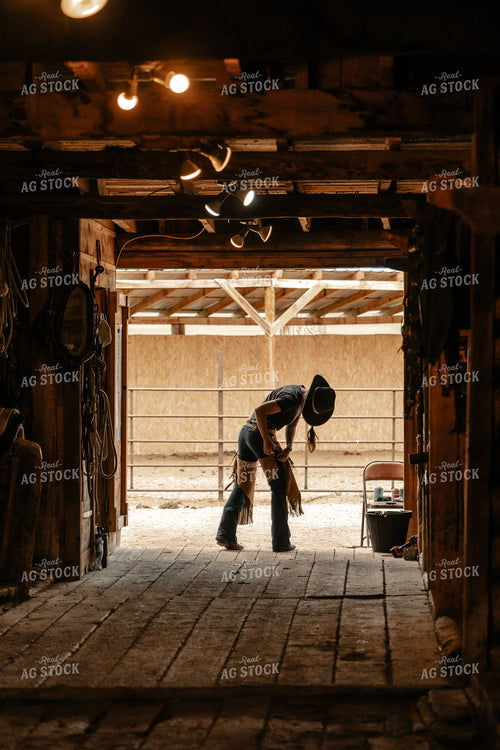 Female Rancher in Horse Barn 58196