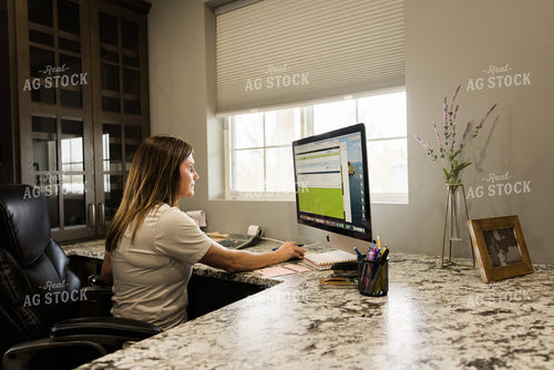 Woman Farmer Works on Computer in Office 7508