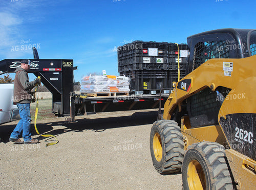 Seed Salesman Unloading Pro Boxes 141219