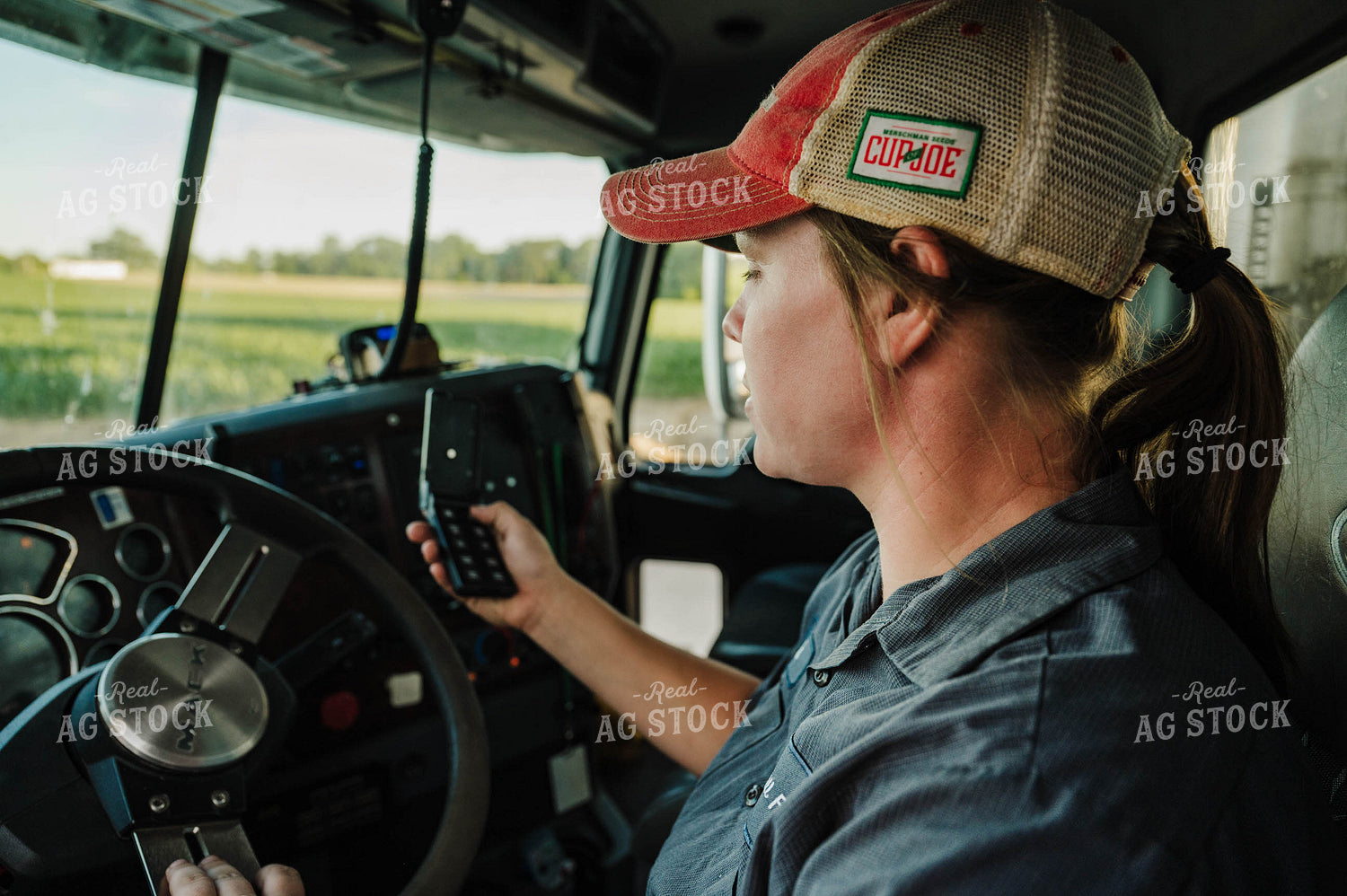 Female Farmer Driving Semi 115283