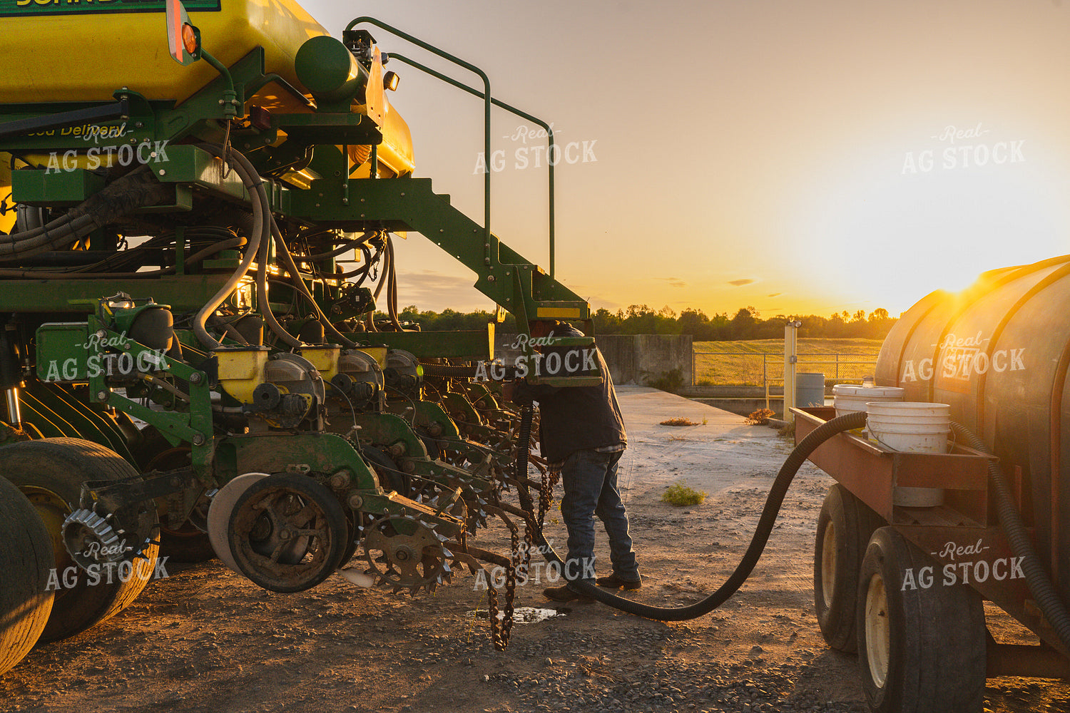 Farmer Working on Planter 128022