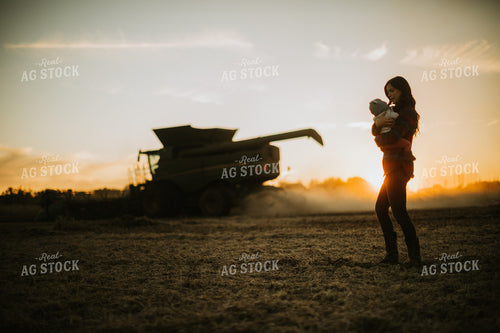 Farm Mom and Wife with Baby in Soybean Field with Combine 5109