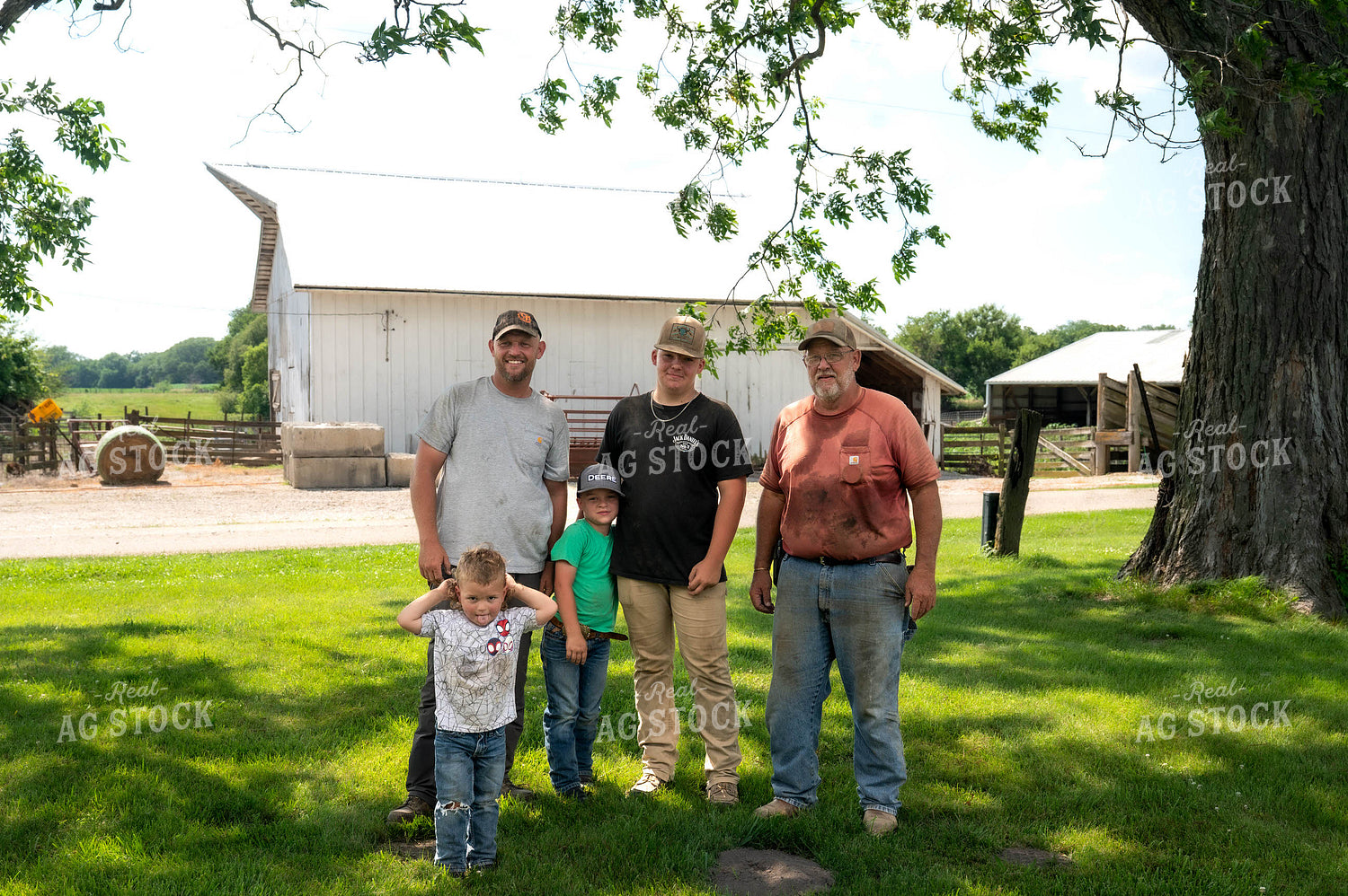 Multi-generational Family on Antique Tractors 115832