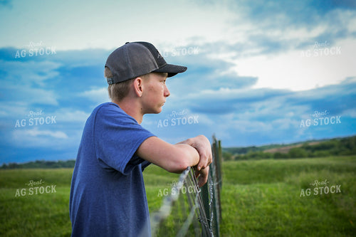 Farm Kid Leaning on Fence 191158