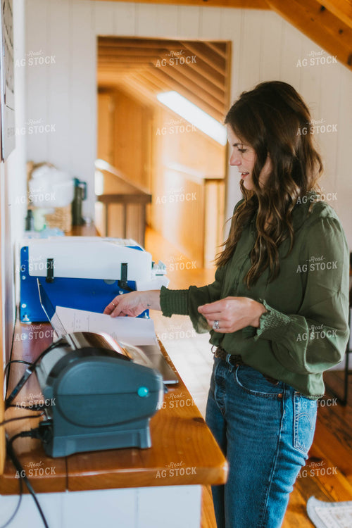 Female Farmer Working on Computer 8481