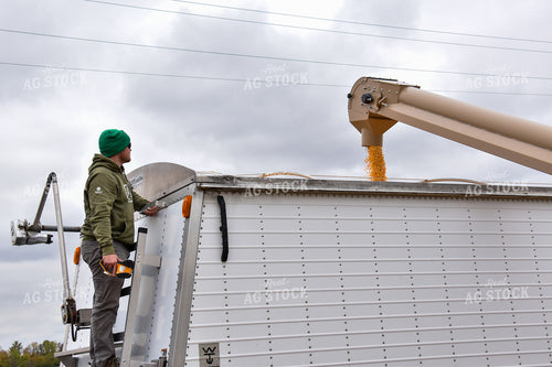 Farmer Watching Truck Fill 84205