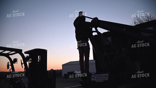 Loading the Seed Tender with a Skidsteer - 101