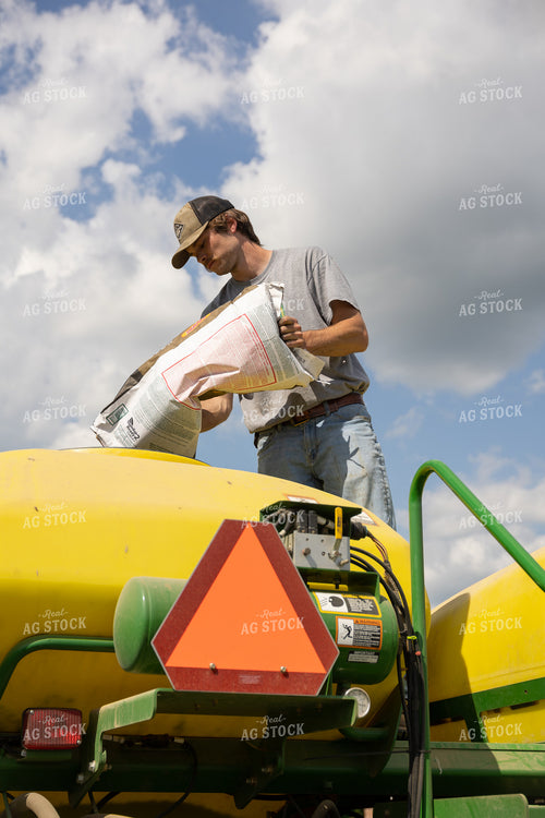 Farmer Filling Planter 52374