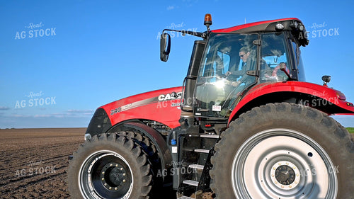 Farmer Climbing into Cab 25226