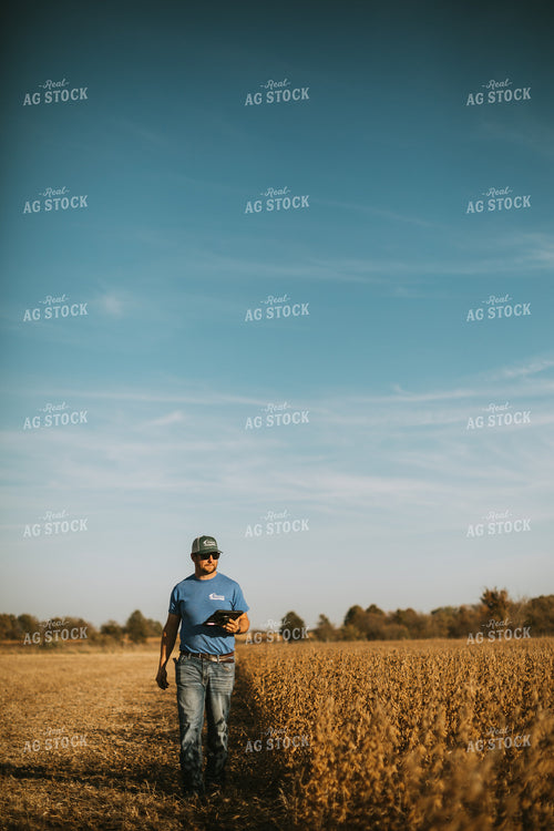 Farmer in Field with Tablet 7180