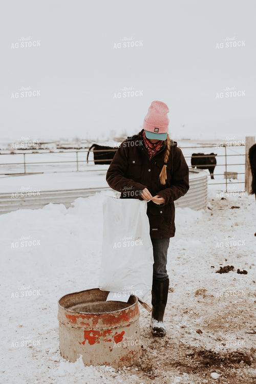Female Rancher Feeding Supplements 61190