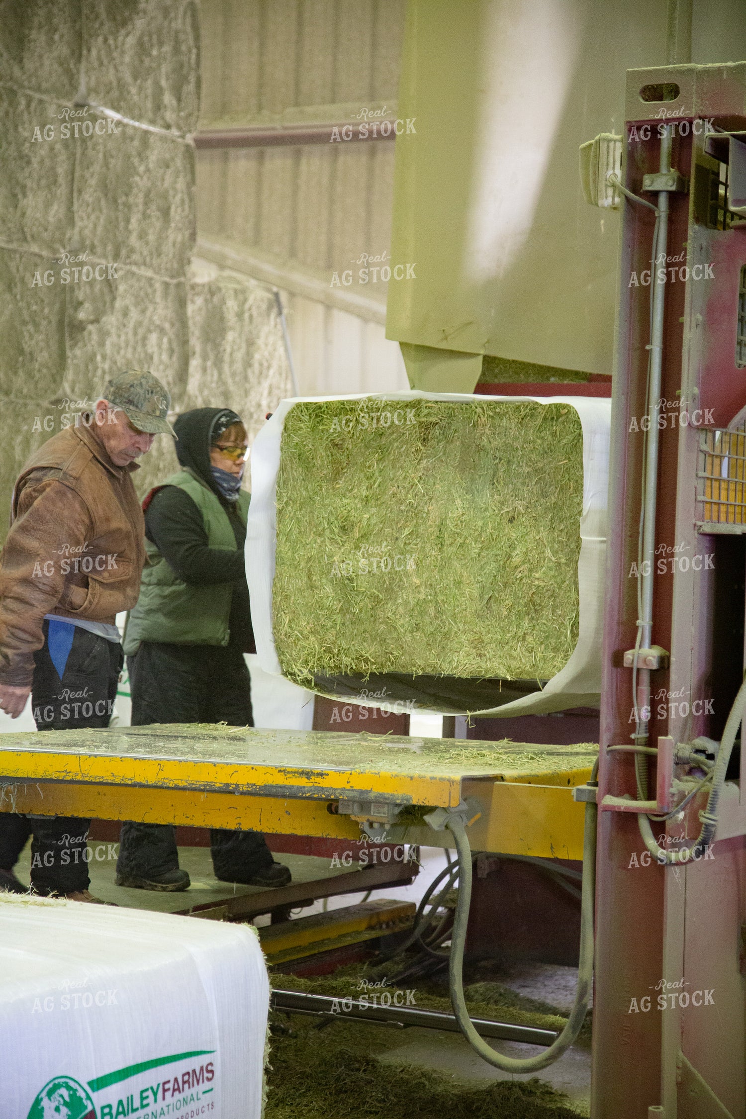 Farmers Wrapping Hay Bales 130017