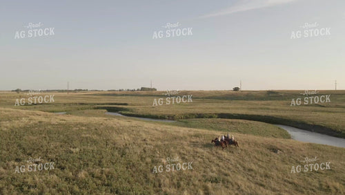 Ranchers on Horseback in Pasture Drone 6535