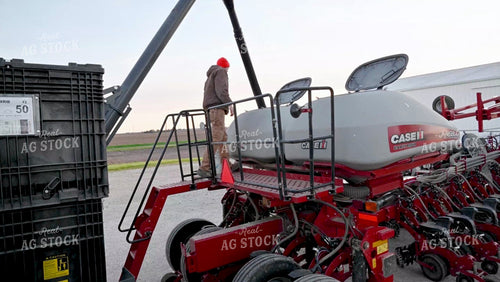 Loading the Planter with the Seed Tender - 128