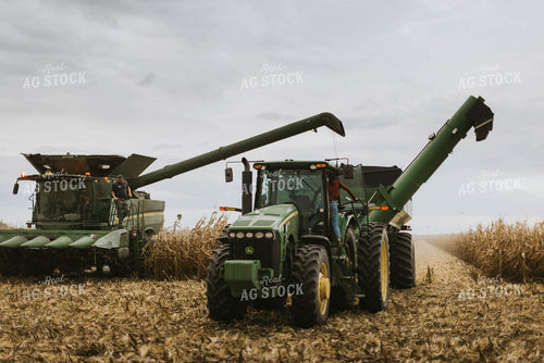 Farmers Climbing out of Harvest Equipment 8584