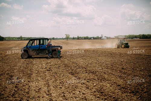 Farm Kid and Mom Picking Up Rocks 169098